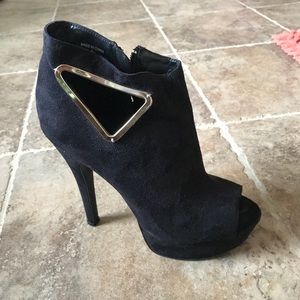 bebe Black and Gold Platform Heels